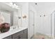 Clean bathroom with vanity, framed mirror, and shower with sliding glass door at 2936 Shumard Dr, Gastonia, NC 28054