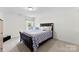 Bright bedroom showcasing a comfortable bed, and a window that offers picturesque outdoor views at 2936 Shumard Dr, Gastonia, NC 28054