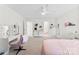 Bright bedroom with plush carpet, desk area, and decorative vanity at 2936 Shumard Dr, Gastonia, NC 28054
