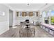 Comfortable home office with natural light, barn door window accents, and light wood flooring at 2936 Shumard Dr, Gastonia, NC 28054