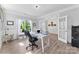 Spacious office with bright window and natural light with white trim and hardwood floors at 2936 Shumard Dr, Gastonia, NC 28054