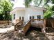 A backyard featuring a wooden deck and access stairs at 3007 West Blvd, Charlotte, NC 28208