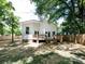 Backyard of home showcasing a deck and privacy fence at 3007 West Blvd, Charlotte, NC 28208