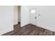 Bright foyer featuring clean white walls, dark floors, and modern fixtures at 3007 West Blvd, Charlotte, NC 28208