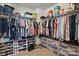 This walk-in closet is equipped with shelving and racks for maximum organization and storage at 314 Pulaski Sw Dr, Concord, NC 28027