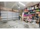Well-lit garage offers ample space for parking and organized storage solutions at 314 Pulaski Sw Dr, Concord, NC 28027