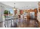 Bright kitchen featuring stainless appliances, granite counters and sliding glass doors to the backyard at 314 Pulaski Sw Dr, Concord, NC 28027