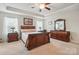 This elegant main bedroom includes a spacious layout, trey ceiling, and two large windows at 314 Pulaski Sw Dr, Concord, NC 28027