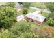 Aerial view of property featuring a detached building, deck, and mature trees at 3430 Stokes Ferry Rd, Salisbury, NC 28146