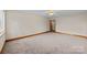 Bright living room featuring neutral carpet, natural trim and a ceiling fan at 3430 Stokes Ferry Rd, Salisbury, NC 28146