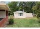 A storage shed in the backyard, offering extra space with a window at 3430 Stokes Ferry Rd, Salisbury, NC 28146