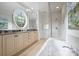 This luxury bath features a soaking tub and a separate glass shower at 4020 Barclay Downs Dr, Charlotte, NC 28209