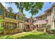 Inviting brick townhomes with manicured lawns, creating beautiful curb appeal at 4020 Barclay Downs Dr, Charlotte, NC 28209