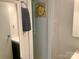 Bright bathroom features a clean, white shower, a modern vanity, mirror, and a cute flower picture at 439 17Th St, Cramerton, NC 28032