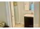 Cozy bathroom features a new vanity with tiled floors and medicine cabinet at 439 17Th St, Cramerton, NC 28032