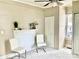 Bedroom features neutral walls, carpet, a fireplace, fan, and closet at 439 17Th St, Cramerton, NC 28032