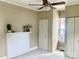 Bedroom with neutral walls, fan, carpet floor, closet and fireplace at 439 17Th St, Cramerton, NC 28032