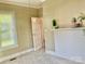 Bright bedroom with a large window and classic decorative fireplace at 439 17Th St, Cramerton, NC 28032