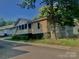 Side view of home featuring neutral siding, a screened-in porch, and a back deck at 439 17Th St, Cramerton, NC 28032
