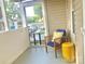 Cozy screened-in porch with comfortable seating at 439 17Th St, Cramerton, NC 28032
