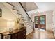 Grand foyer with hardwood floors, a staircase, and a view of the entryway at 4501 Montibello Dr, Charlotte, NC 28226