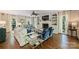 Bright living room boasting a fireplace, built-in shelves, hardwood floors and neutral décor at 4501 Montibello Dr, Charlotte, NC 28226
