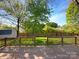 Wooden deck with a railing overlooking the backyard and privacy fence at 4656 Chaucer Nw Pl, Concord, NC 28027
