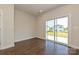 Bonus room features hardwood floors and sliding glass doors that offer outdoor access at 5017 Poplin Vly, Cherryville, NC 28021