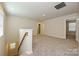 Large bonus room featuring neutral paint, plush carpeting, and ample natural light at 5017 Poplin Vly, Cherryville, NC 28021