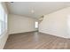 A spacious, brightly lit living room with sleek, modern flooring at 5021 Poplin Vly, Cherryville, NC 28021