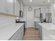 Stylish kitchen with sleek countertops, stainless steel appliances, and chic gray cabinetry and modern finishes at 5024 Colline Ct, Charlotte, NC 28216