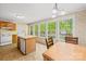 Bright eat-in kitchen with center island, modern appliances, and plenty of natural light at 5039 Pine Springs Dr, Bessemer City, NC 28016