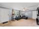 Inviting living room with plush seating, neutral carpeting and bright, natural light at 5039 Pine Springs Dr, Bessemer City, NC 28016