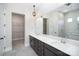 Bathroom with double vanity, gray tile floor, and a separate toilet room and closet at 515 Edmunds Ln # 38, Clover, SC 29710