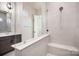 Bathroom with walk-in tiled shower, glass partition, and modern fixtures at 515 Edmunds Ln # 38, Clover, SC 29710