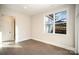 Bedroom featuring lots of light and a view to the side yard and gray vinyl floors at 515 Edmunds Ln # 38, Clover, SC 29710