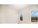 Cozy bedroom featuring two large windows that provide ample natural light and views of the surrounding landscape at 515 Edmunds Ln # 38, Clover, SC 29710