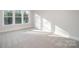 Bright, empty bedroom with carpet, large windows, and natural light at 515 Edmunds Ln # 38, Clover, SC 29710