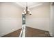 Dining room featuring hardwood floors, board and batten, and modern chandelier at 515 Edmunds Ln # 38, Clover, SC 29710