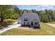 Charming two-story home with stone accents, covered porch, and attached garage at 515 Edmunds Ln # 38, Clover, SC 29710
