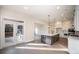 Bright kitchen boasts an island with bar seating and stainless steel appliances at 515 Edmunds Ln # 38, Clover, SC 29710
