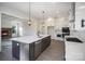 Modern kitchen featuring stainless steel appliances, granite countertops, and a central island at 515 Edmunds Ln # 38, Clover, SC 29710