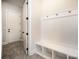 Functional mud room features built-in bench seating, cubbies, and durable tile flooring, blending style with utility at 515 Edmunds Ln # 38, Clover, SC 29710