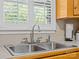 Close up on a double sink with chrome faucet situated near the window at 5159 Taxahaw Rd, Lancaster, SC 29720