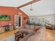 Spacious living room with hardwood floors, a high ceiling, and a cozy sectional sofa at 5159 Taxahaw Rd, Lancaster, SC 29720