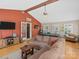 Spacious living room with hardwood floors, a high ceiling, and a cozy sectional sofa at 5159 Taxahaw Rd, Lancaster, SC 29720