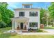 Charming two-story home features a covered porch, new landscaping, and updated finishes, perfect for modern living at 5227 Pinebrook Dr, Charlotte, NC 28208