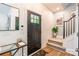Bright foyer boasts a modern staircase, stylish decor, and a welcoming atmosphere, perfect for receiving guests at 5227 Pinebrook Dr, Charlotte, NC 28208