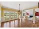 Dining room featuring hardwood floors and a picturesque view at 5335 Lower Shoal Creek Ct, Charlotte, NC 28277