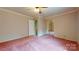 Bedroom with light pink carpet and a ceiling fan is perfect for comfortable living at 611 Stowe Rd, Clover, SC 29710